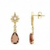 18K PENDIENTES ESTRELLAS PIEDRA PERA COLOR ALEJANDRITA. 29 X 7 MM.