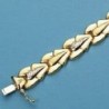 18K PULSERA BICOLOR ESTAMPACION. 12.25 GRS.