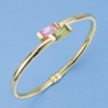 18K PULSERA RIGIDA PIEDRAS. 13.75 GRS.