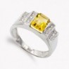 18K SORTIJA ORO BLANCO PIEDRA COLOR Y CIRCONITAS.