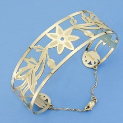 18K PULSERA FLORES RIGIDA....