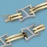 18K PULSERA CIRCONITAS BICOLOR. 29.15GRS.