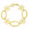 18K PULSERA BICOLOR FLORES. ANCHO: 15 MM. LARGO: 19 CM.