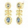 18K PENDIENTES ORO AMARILLO CUBANAS CON LAZO CIRCONITAS AGUAMARINA. 55 X 20 MM