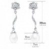 18K PENDIENTES ORO BLANCO PERLAS 9 X 7 MM FLOR. 38 X 8 MM.