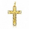 18K CRUZ CON CRISTO TALLADA. 27 X 17 MM.