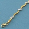 18K PULSERA BICOLOR CIRCONITA. 7.15 GRS.