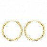 18K AROS ORO AMARILLO HUECOS RETORCIDOS. 20 X 2 MM.