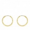 18K AROS ORO AMARILLO HUECOS RETORCIDOS CON TALLADO. 15 X 1,30 MM