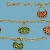 18K PULSERA BOLSOS ESMALTE.
