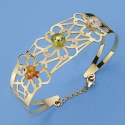 18K PULSERA FLORES RIGIDA....