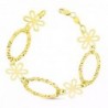 18K PULSERA ESLABONES Y FLORES 5.65 GRS.