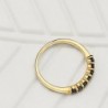 18K SORTIJA ORO AMARILLO 7 CIRCONITAS VERDES GARRAS. ANCHO CUERPO: 2 MM