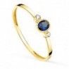 18K SORTIJA ORO AMARILLO PIEDRA AZUL Y CIRCONITAS 4 X 3 MM. ANCHO CUERPO: 1,2MM