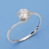 18K SORTIJA ORO BLANCO GARRAS CIRCONITAS.