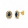 18K PENDIENTES PIEDRA AZUL 9 X 7 MM.